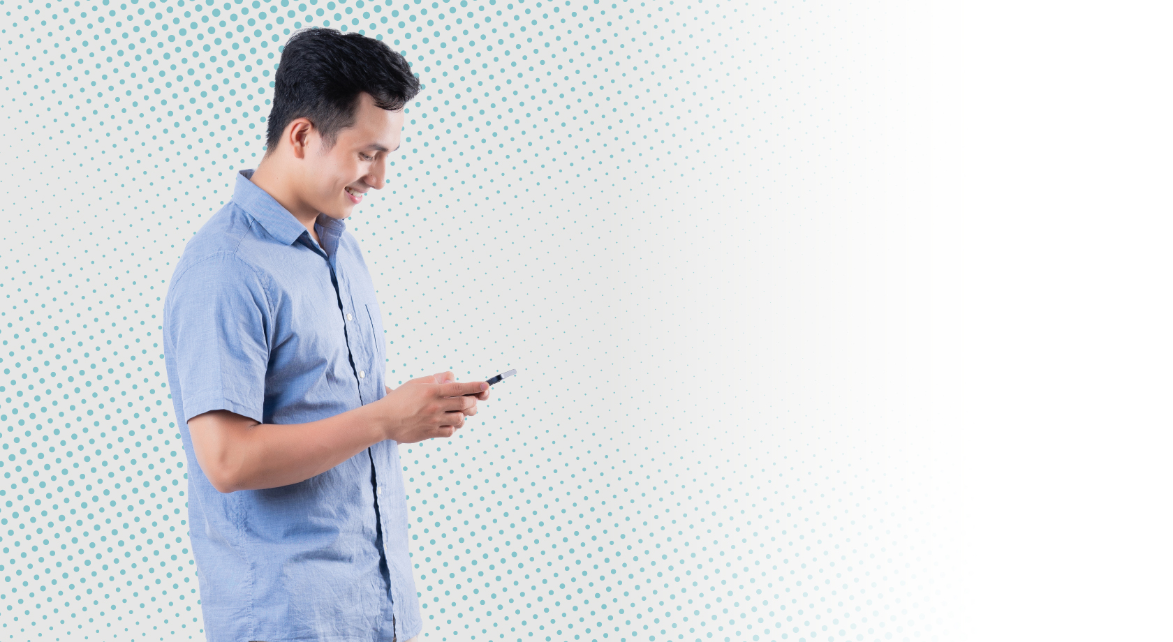 Young man checking mobile phone. 