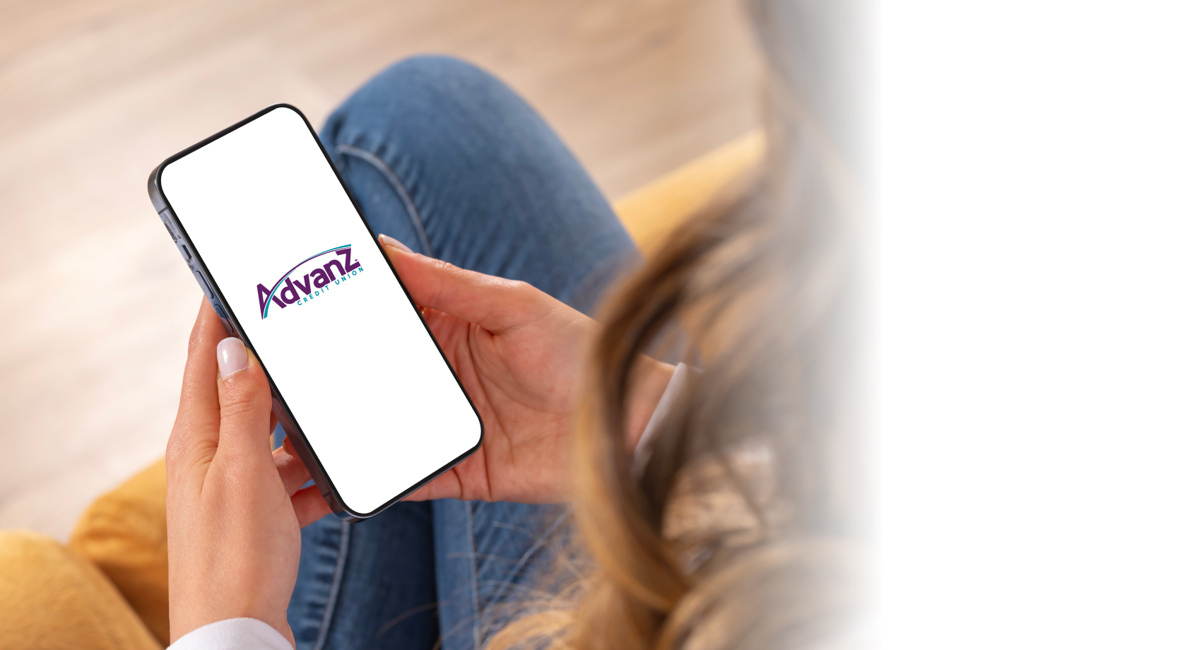 Photo of a cell phone with Advanz displayed on the screen